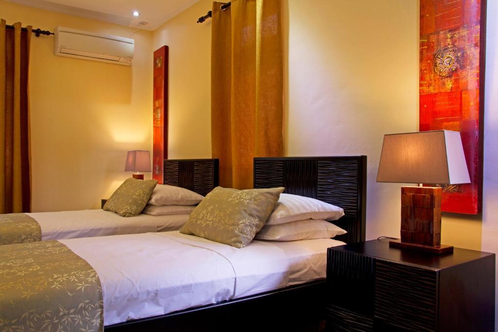 Apartamento The Palm Seychelles Bel Ombre Habitación foto